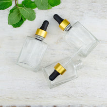 Load image into Gallery viewer, 100 Pcs Clear Glass 30 ml LUXURY Dropper Bottle, Flat Glass 1 Oz Medicine Serum, 1 Oz Essential Oil Bottles Refillable