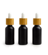 Load image into Gallery viewer, 3 Dark AMBER 30ml BAMBOO Dropper Bottles 1 Oz Boston Round Shape Glass Pipette White or Black Bulbs