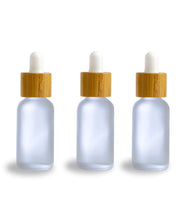 Load image into Gallery viewer, Single white 30ml glass bamboo dropper bottles 1 oz boston round white or black bulbs