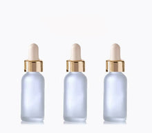 Load image into Gallery viewer, 100 FROSTED 60ml Glass Bottles w/ Metallic Gold Glass Dropper Pipette 2 Oz UPSCALE LUXURY Cosmetic Skincare Packaging, Serum Essential Oil