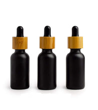 Load image into Gallery viewer, 3 Dropper Bottles 1 Oz MATTE BLACK Glass w/ BAMBoO Droppers 30ml Boston Round Shape White or Black Bulbs Essential Oil,  Serum Tincture,