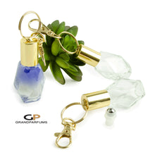 Load image into Gallery viewer, 3 Keychain Oil Roller Bottles 7.5 ml GEO Essential Oil Rollers | Roll On Bottles Portable Refillable 7.5ml Oil Roller Gold or Silver Cap