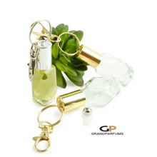 Load image into Gallery viewer, 3 Keychain Oil Roller Bottles 7.5 ml GEO Essential Oil Rollers | Roll On Bottles Portable Refillable 7.5ml Oil Roller Gold or Silver Cap